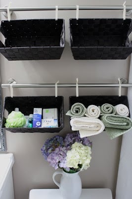 Make your bathroom beautiful and organized with some great bathroom storage ideas! Find new ideas to store all your bathroom items from towels to cotton balls. 30 Bathroom Storage Ideas via Remodelaholic.com #storage #bathroom #bathroomstorage #organization