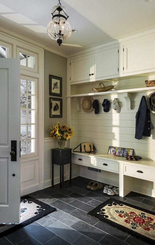 entryway bench with drawers and storage underneath, plus cabinets AND a shelf above. This is great! | 100+ Beautiful Mudrooms and Entryways at Remodelaholic.com