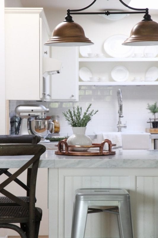 diy-kitchen-remodel-copper-light-update-marble-tile-countertop-subway-tile-backsplash-Zevy-Joy-featured-on-@Remodelaholic