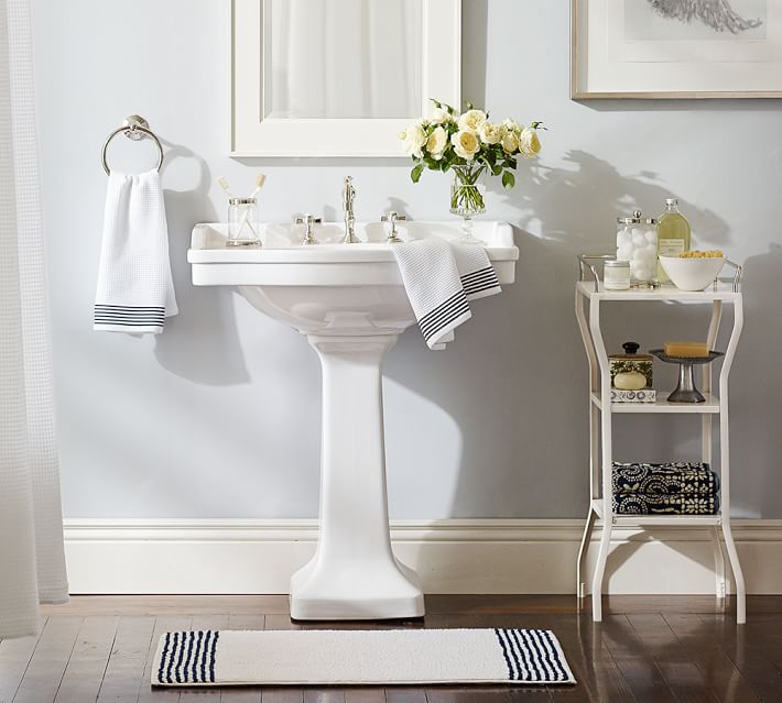 Make your bathroom beautiful and organized with some great bathroom storage ideas! Find new ideas to store all your bathroom items from towels to cotton balls. 30 Bathroom Storage Ideas via Remodelaholic.com #storage #bathroom #bathroomstorage #organization