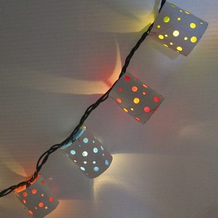 String lights are an inexpensive way to dress up so many areas in the home. Outdoor, indoor, dress them up and more. 36 Clever Ways to Use String Lights via Remodelaholic.com