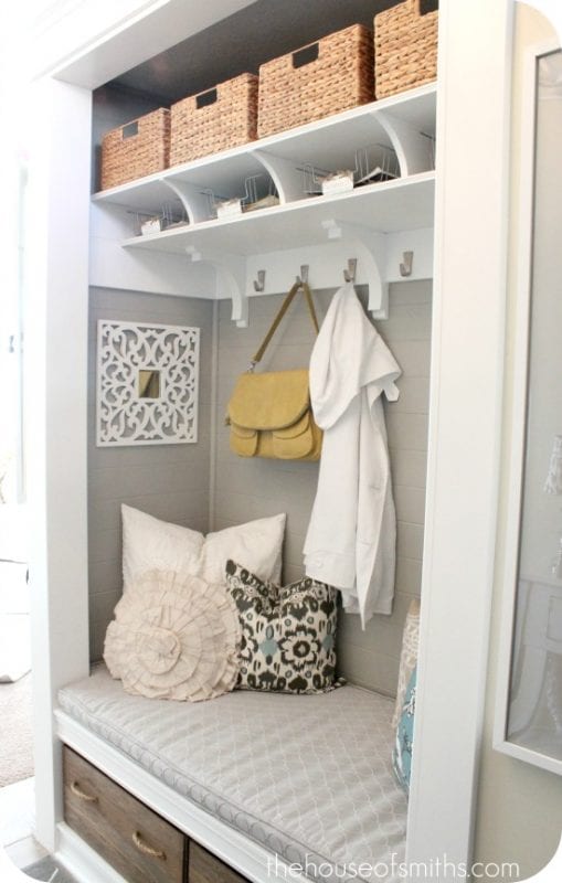 Closet made into Mudroom, love the profile of the shelves and the rope handled wood boxes below the bench | 100+ Beautiful Mudrooms and Entryways at Remodelaholic.com