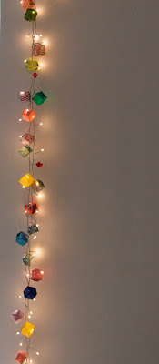 String lights are an inexpensive way to dress up so many areas in the home. Outdoor, indoor, dress them up and more. 36 Clever Ways to Use String Lights via Remodelaholic.com
