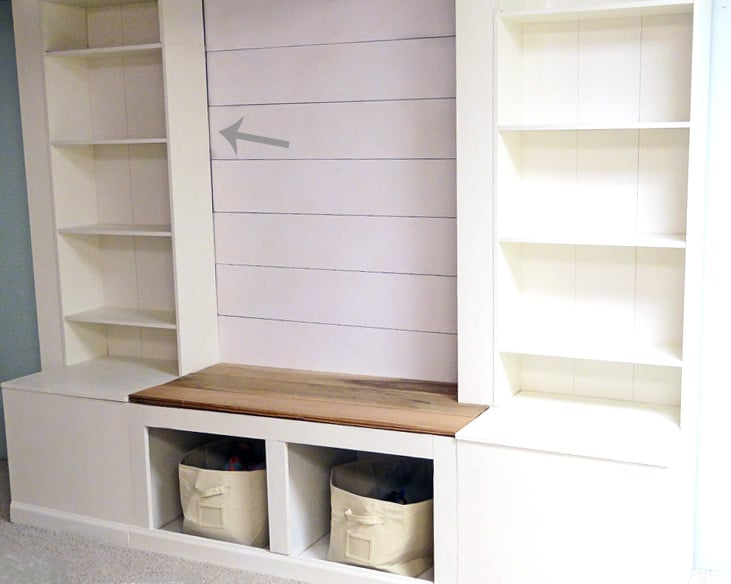 How-to-Build-a-Wall-Storage-Media-System with a shiplap backdrop featured on Remodelaholic.com