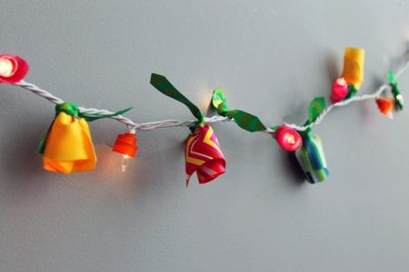 String lights are an inexpensive way to dress up so many areas in the home. Outdoor, indoor, dress them up and more. 36 Clever Ways to Use String Lights via Remodelaholic.com