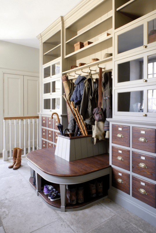 bootroom entry, the bumpout with the bench and storage for umbrellas in the middle is pretty sweet | 100+ Beautiful Mudrooms and Entryways at Remodelaholic.com