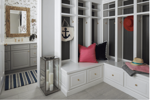 Beautiful back entry mudroom, right by the powder room. I need the drawers underneath the bench! | 100+ Beautiful Mudrooms and Entryways at Remodelaholic.com