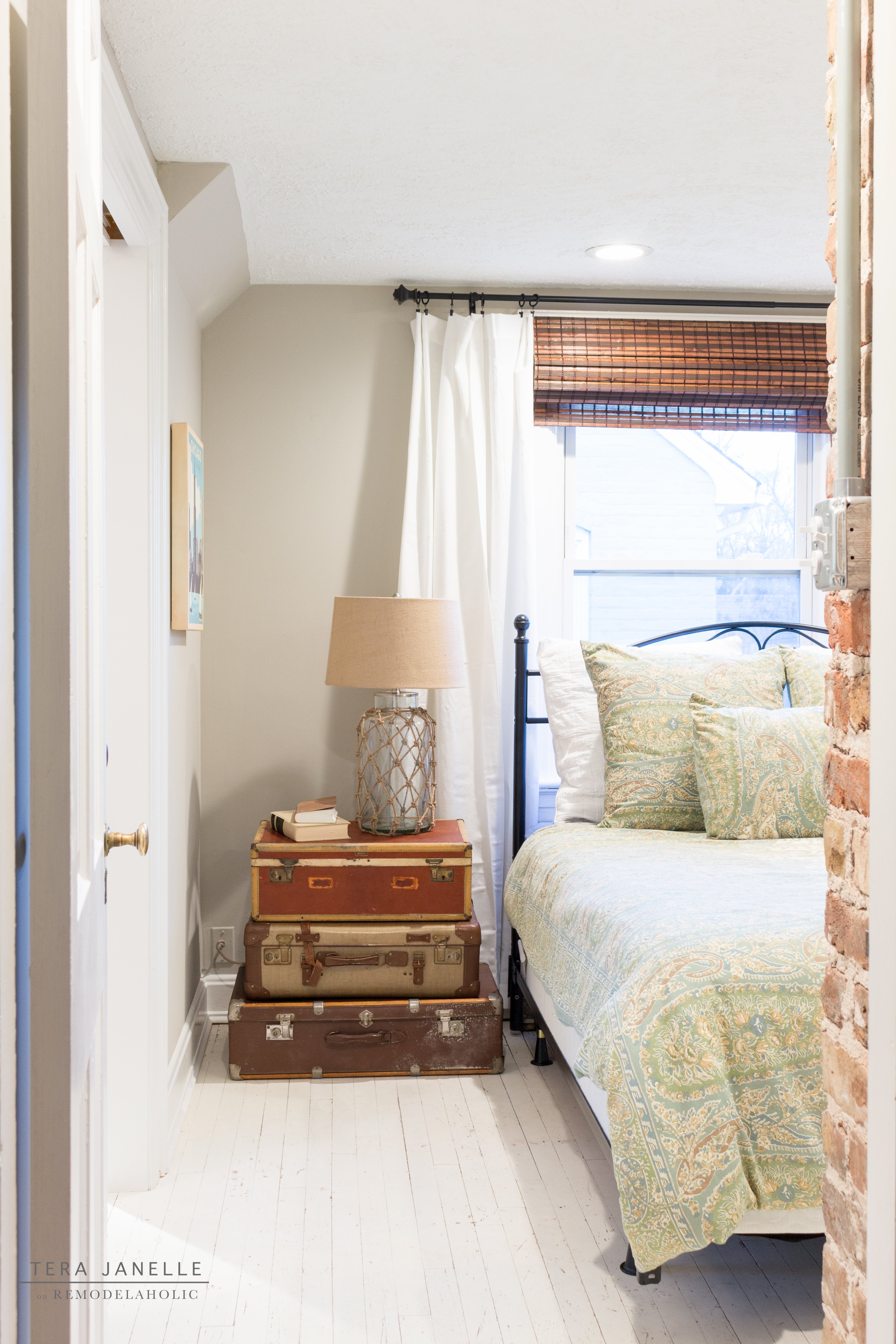 A Vintage, Travel-Inspired Master Bedroom | Remodelaholic