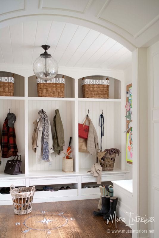 Unique mudroom cabinets, I really like the shape of the locker sections and the sliding shoe storage underneath | 100+ Beautiful Mudrooms and Entryways at Remodelaholic.com
