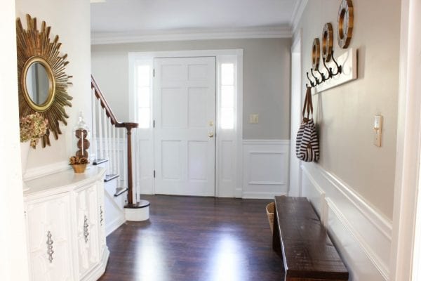 neutral gold entryway | 100+ Beautiful Mudrooms and Entryways at Remodelaholic.com