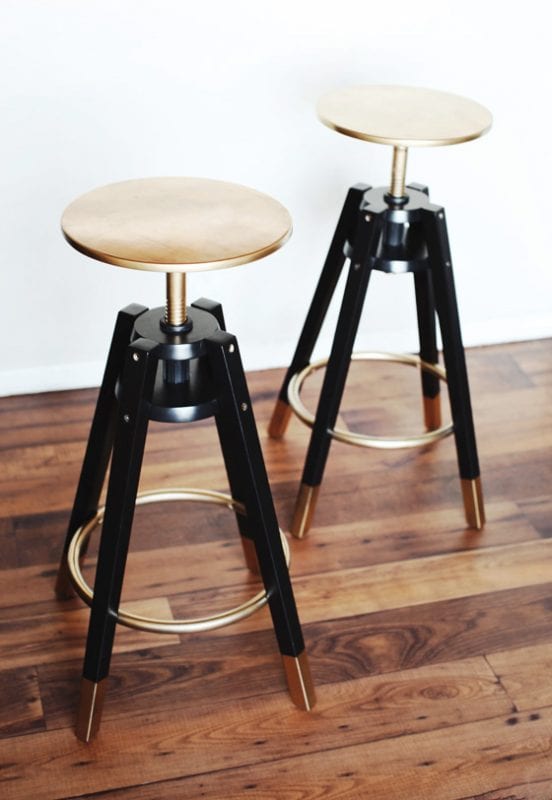 gold and black barstools melodrama