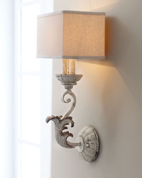 Wall sconce and vintage doors make amazing bedside lighting, by Simple Nature Decor featured on @Remodelaholic