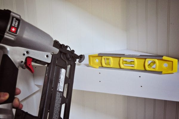 attach a shelf face to a corner floating shelf in a closet organization project