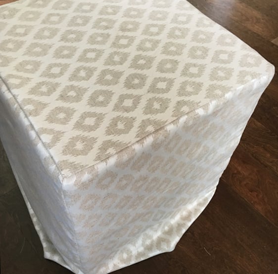 ottoman being upholstered