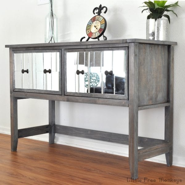 Mirrored-console-table little free monkeys