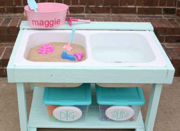 feat-Adorable-kids-sand-and-water-table-from-an-old-kitchen-sink-by-Tattered-and-Inked-featured-on-@Remodelaholic