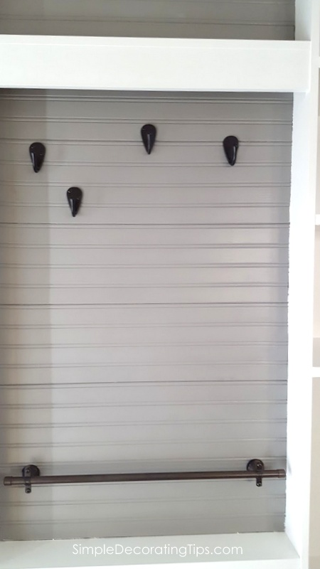 DIY Wall Mounted Pot Rack from a Shallow Display Cabinet | Remodelaholic
