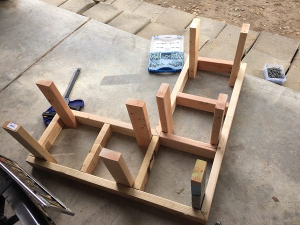 Attach legs to inside of frame using 2 1/2 wood screws and wood glue