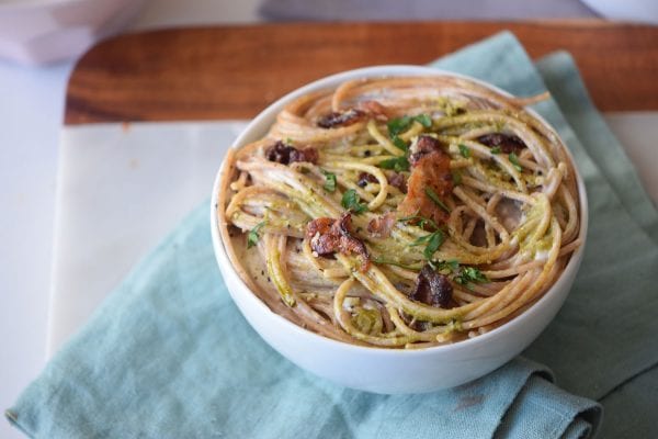 The perfect easy comfort food recipe for dinner. Creamy Pesto Pasta via remodelaholic.com