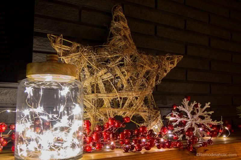 Looking to decorate your mantel for Christmas, but aren't sure where to start? Try these tips for creating a whimsical and rustic Christmas Mantel featured on Remodelaholic.com