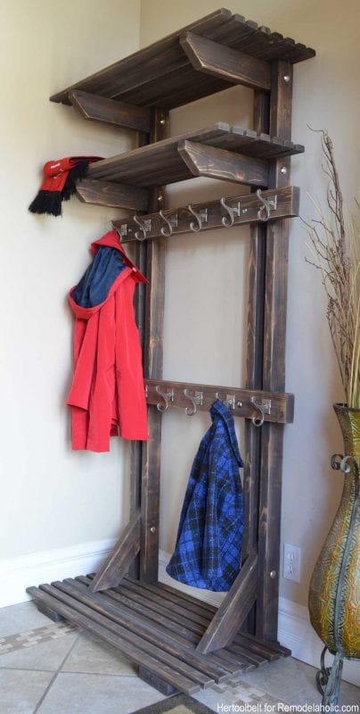 Building extra storage for your coats is easy with this free plan for a DIY hall tree coat rack. 
