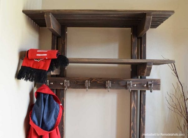 Building extra storage for your coats is easy with this free plan for a DIY hall tree coat rack. 