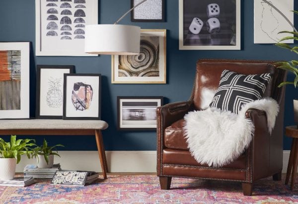 Pink Vintage Style Rug In A Navy Blue Room Via Wayfair