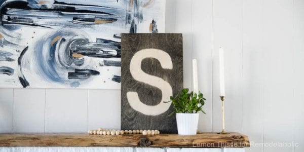 DIY Plywood Sign- simple and striking- I love the stained effect on this!