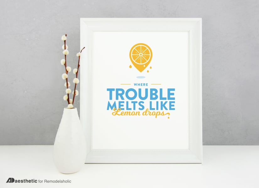 Channel The Wizard of Oz's "somewhere over the rainbow" with this cheery yellow and blue "where trouble melts like lemon drops" printable for your home decor.  Perfect for a nursery or family room, or for a feature in a gallery wall. #remodelaholic #freeprintableartcollection