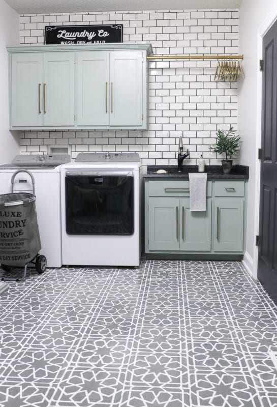 https://www.remodelaholic.com/wp-content/uploads/2018/09/Laundry-Room-Makeover-Subway-Tile-2-Sincerely-Sara-D-545x800.jpg