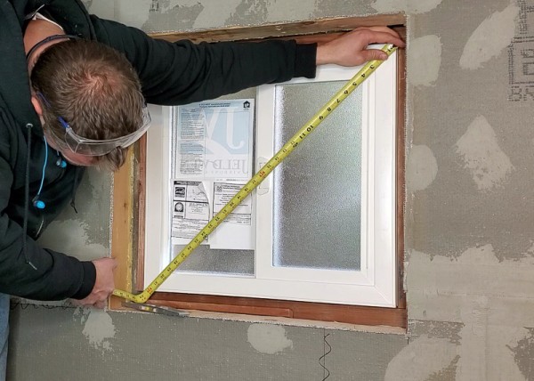 Installing window in basement bathroom