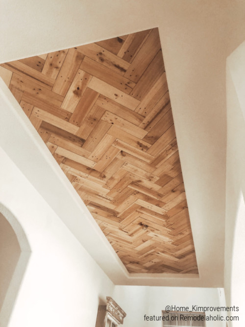 Inexpensive DIY Herringbone Wood Ceiling Using Pallets | Remodelaholic