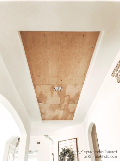 Inexpensive DIY Herringbone Wood Ceiling Using Pallets | Remodelaholic