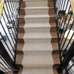 Carpeted Stair Runner Rug On Open Wood Staircase With Black Baluster Railing And Gold Handrail, Remodelaholic SL18 H04