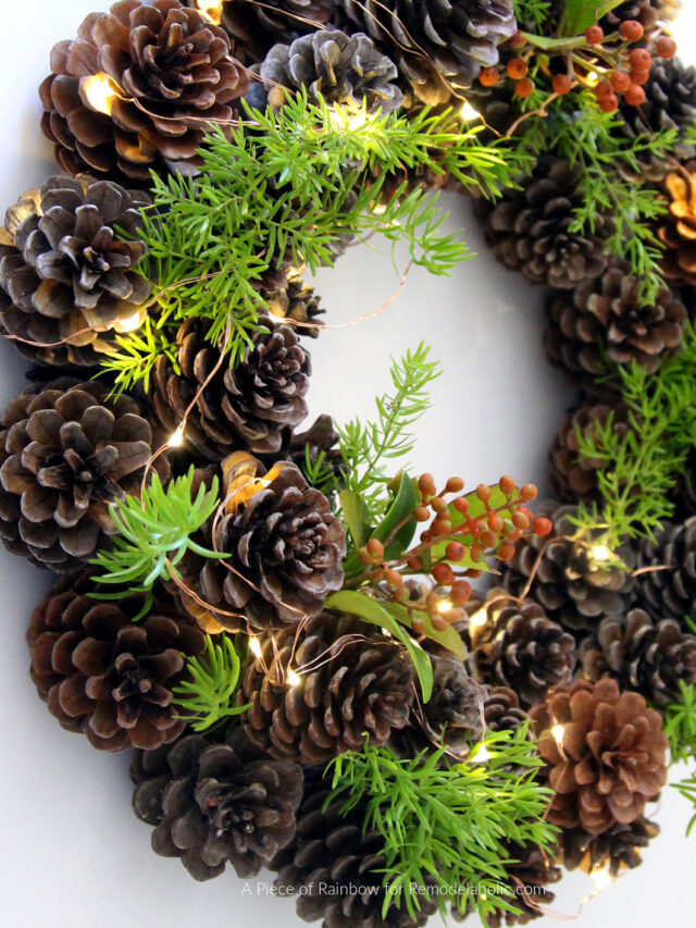 DIY Simple Pinecone Wreath With Pine And Berries And Fairy Lights Remodelaholic