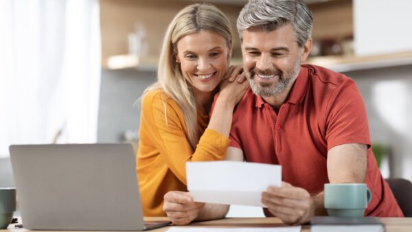 Couple Checking Home