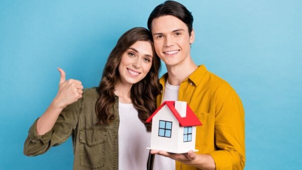 Couple Home Owner Thumbs Up