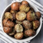 Herb Roasted Potatoes in a white bowl